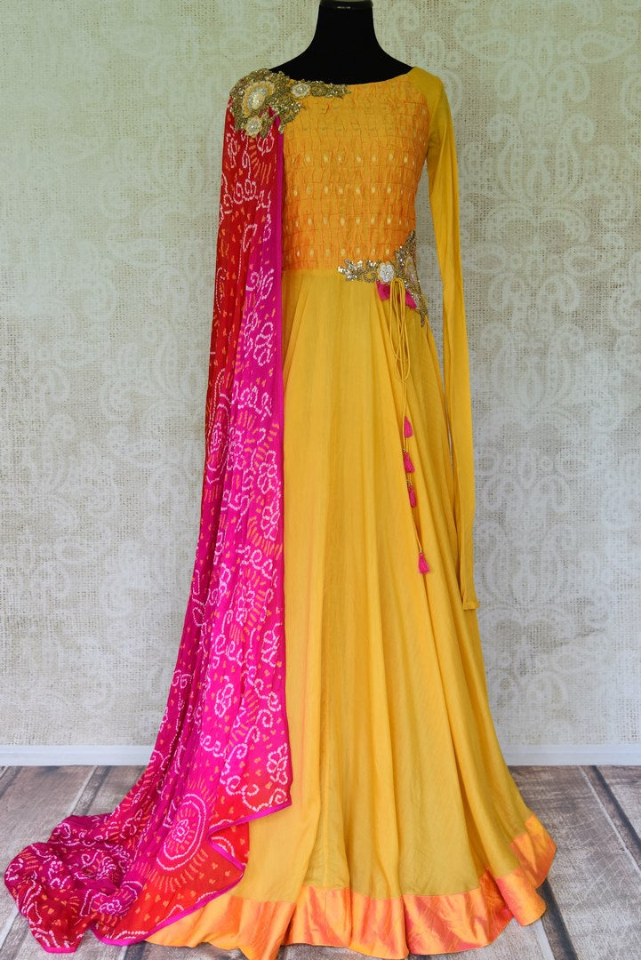 yellow dress with pink dupatta