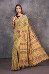 Shop this classy mustard yellow hand painted madhubani cotton saree online in USA. Perfect to be worn as part of your everyday work wear, with this hand-painted Mustard Yellow Madhubani saree, elegance meets traditional. Add this designer Lambani embroidery designer saree to your collection from Pure Elegance Indian Fashion Store in USA.- Full view.