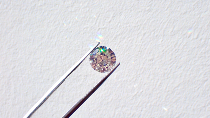 Round Diamond in Tweezers