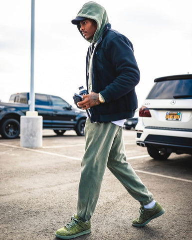 Los Angeles Rams NFL Star Jalen Ramsey wearing the Olive Rude Vogue Sweatpant and Hoodie Sweatsuit Set arriving for their game against the Detroit Lions