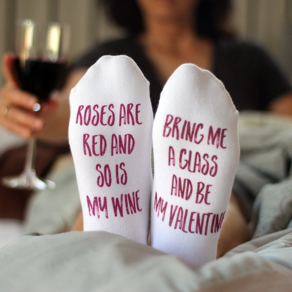 This is an image of Valentine's Day wine-themed bottoms up custom printed socks.
