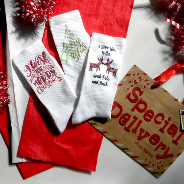 This is an image of three pairs of Christmas custom printed socks.