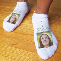 This is an image of Valentine's Day themed socks with a custom printed image.