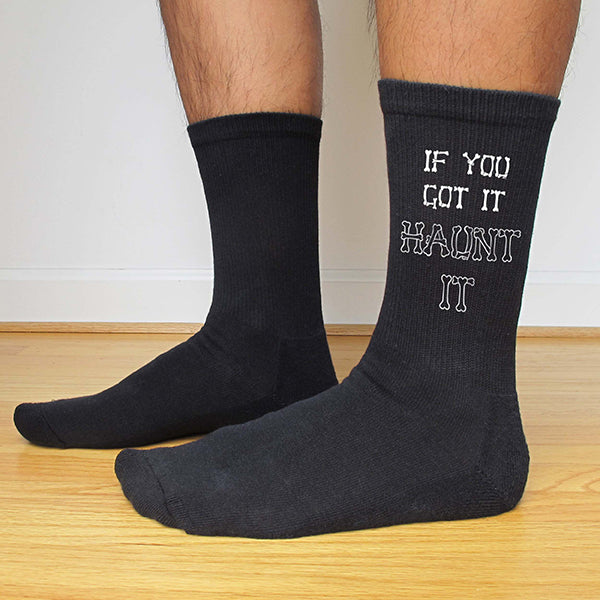 This is an image of If You Got It Haunt It Halloween black crew socks.