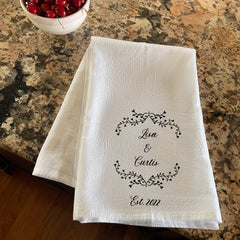 personalized cotton kitchen towel for 2nd anniversary gift personalized with a couple's name and wedding date