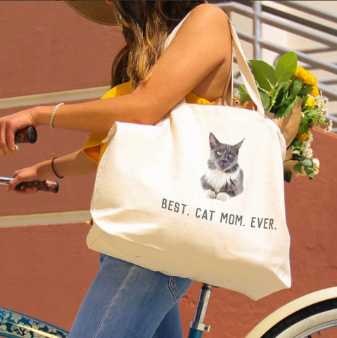 Picture of a customizable canvas tote with a cat photo on it and the words "Best. Cat. Mom. Ever."