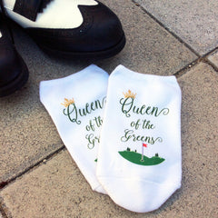 This is an image of custom printed "Queen of the Greens" golf socks.