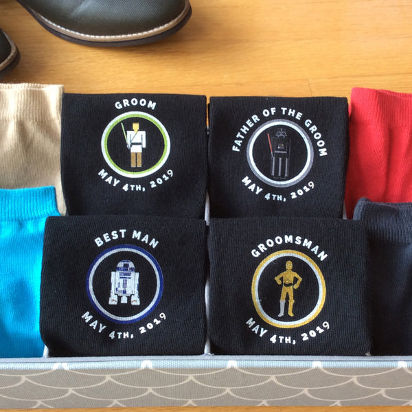 This is an image of 4 pairs of customized Stars Wars inspired wedding socks.