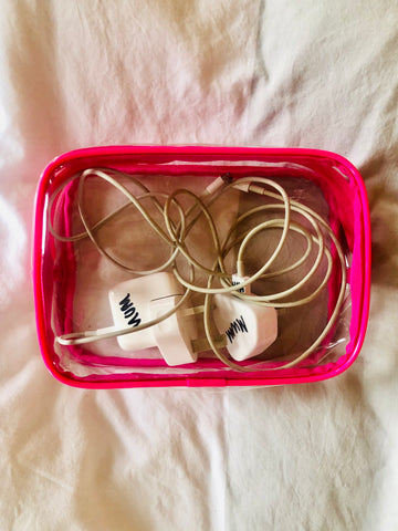 Clear makeup bag used to organise computer cables