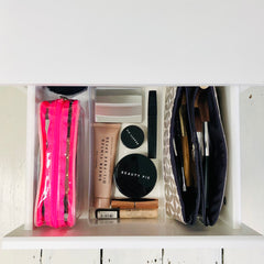 Clean organised and tidy cosmetics in makeup bags and cosmetic case