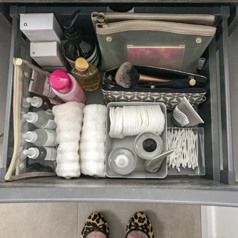 organised dressing table drawer with makeup bags and cosmetics bags