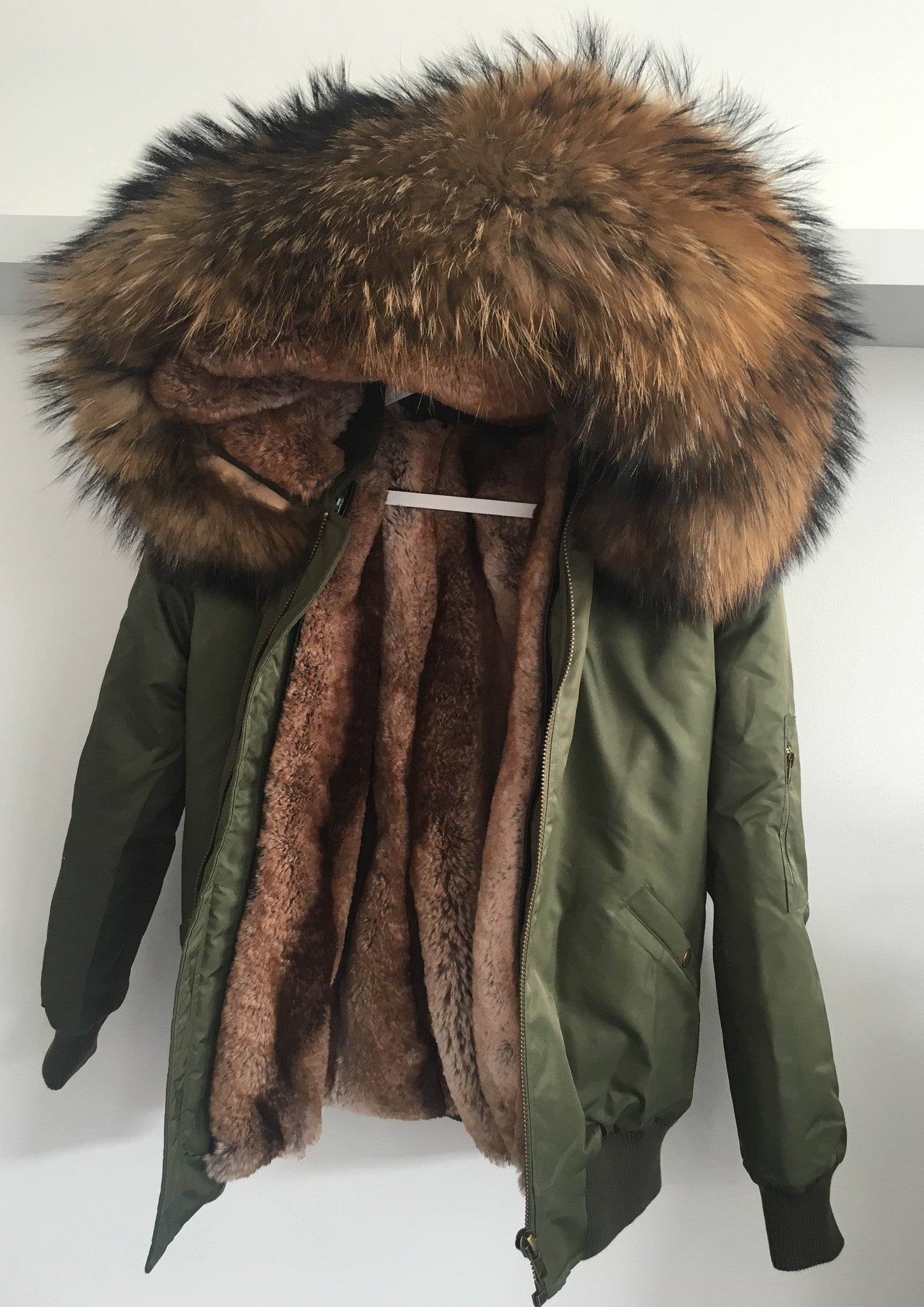 green bomber jacket with fur hood