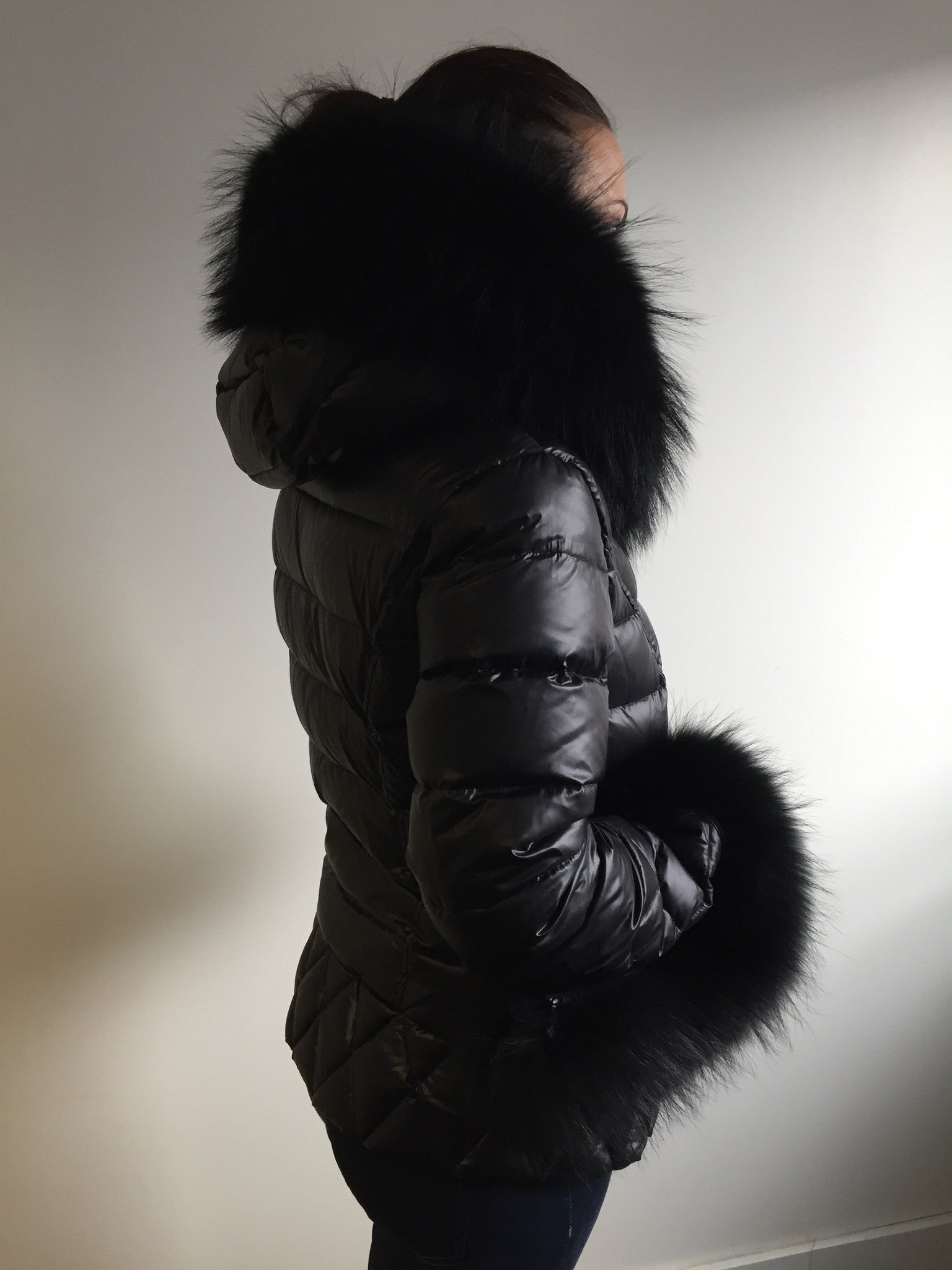 black coat with fur hood and cuffs