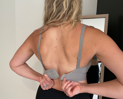 back of woman wearing everyday bra