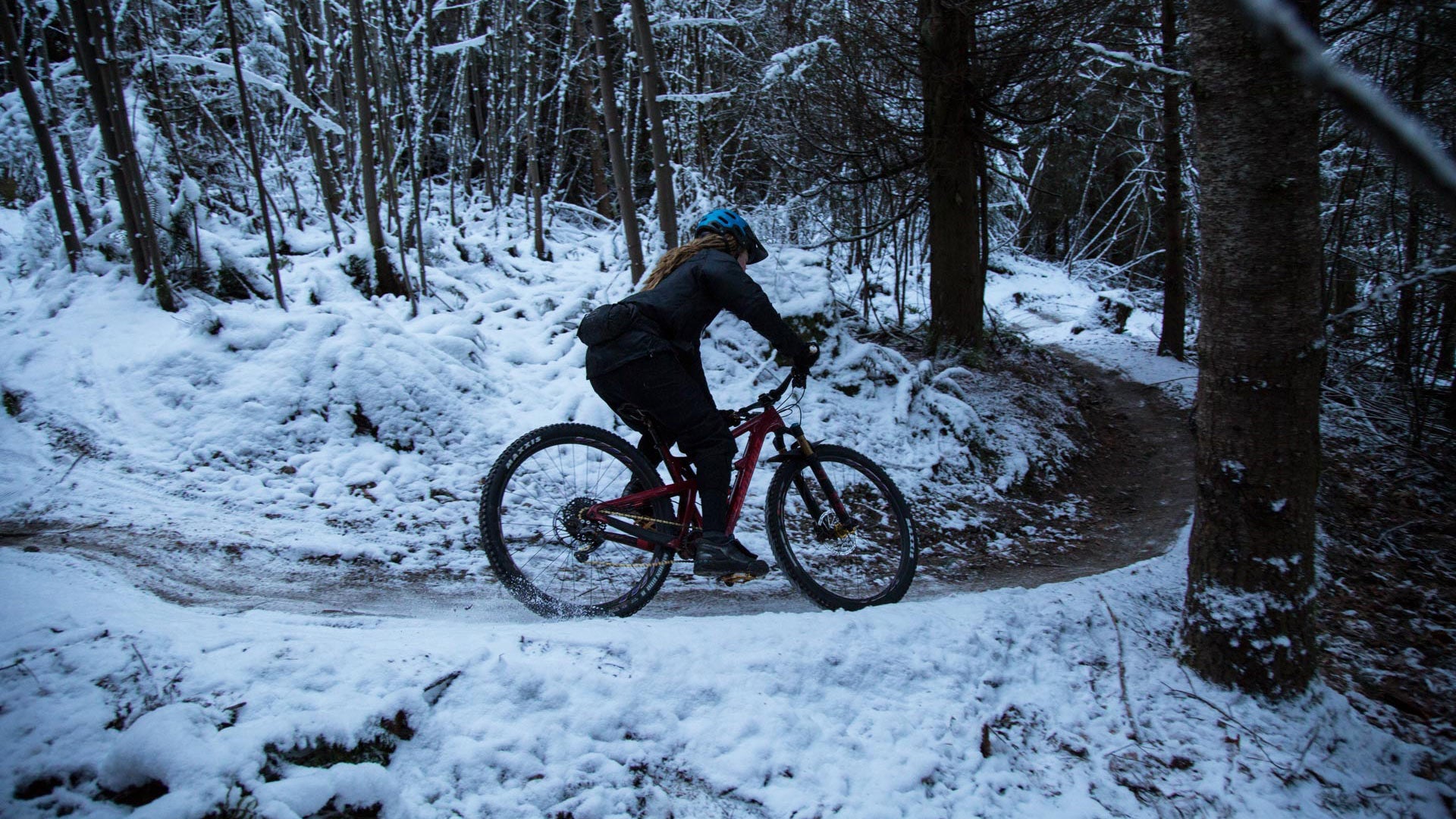 Pedaling into and out of a corner aboard my Onyx equipped Santa Cruz Hightower