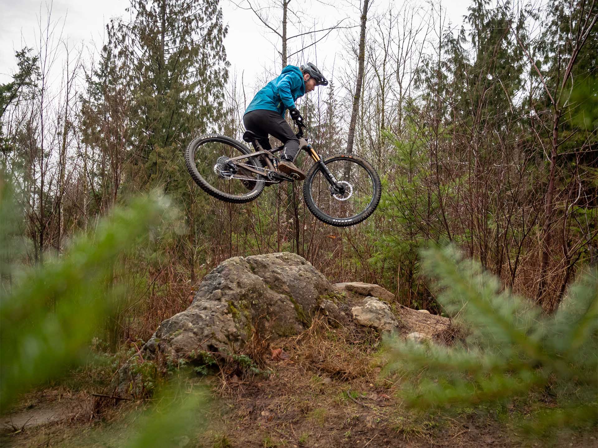 This bike likes to fly so much it’ll get airborne off of downhill rock rolls - going uphill. Rider: Logan Nelson