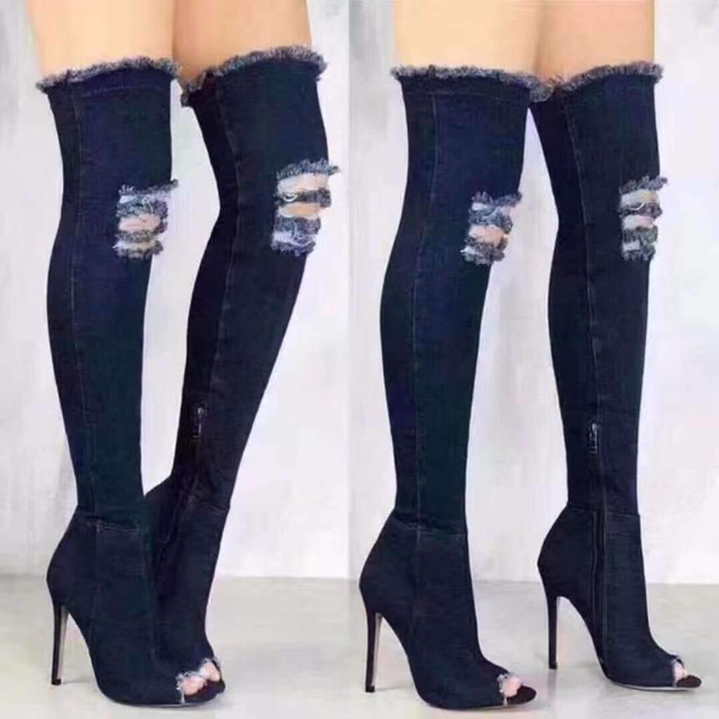 high boots with ripped jeans