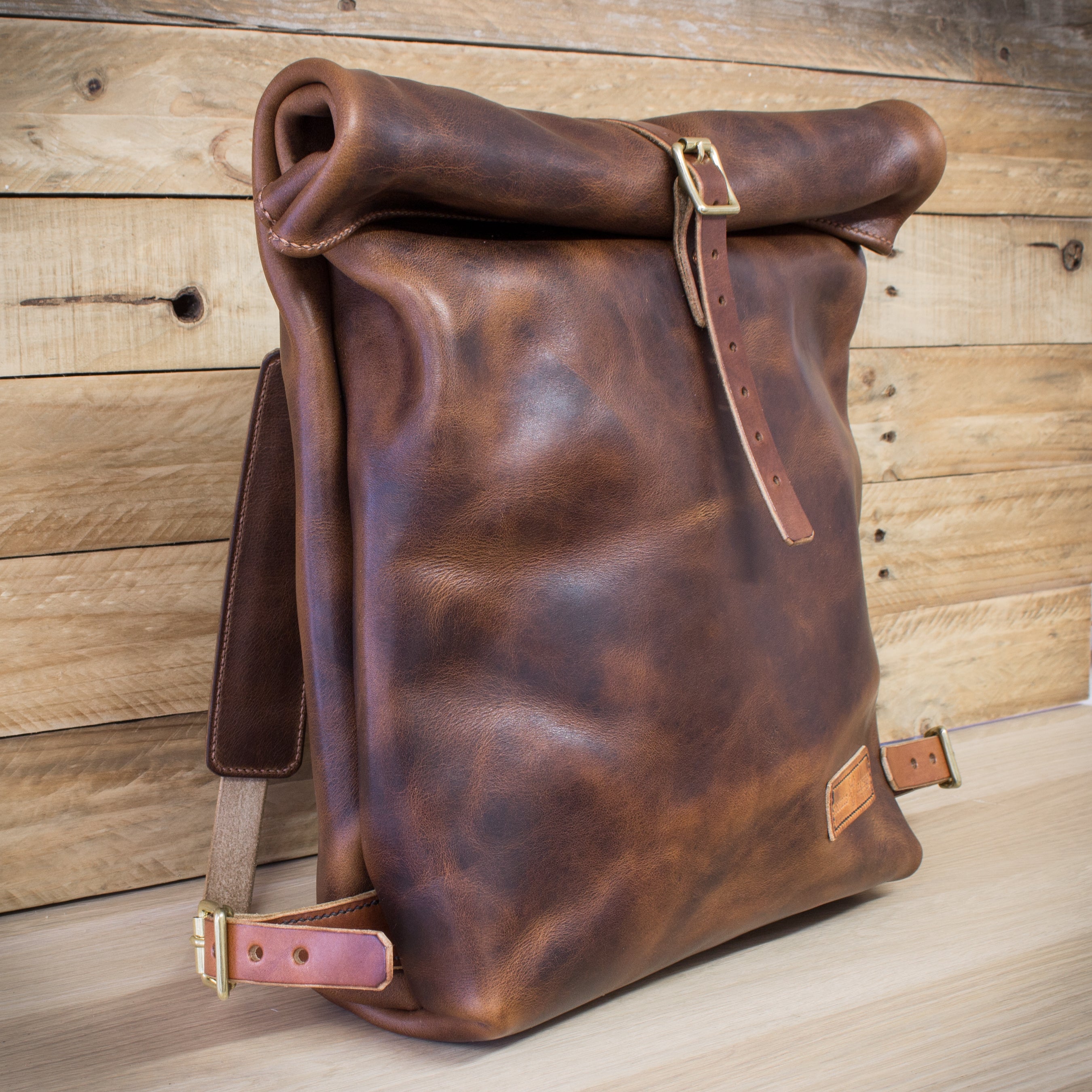 Side shot of Colville Leather roll top backpack made from Horween Derby ...