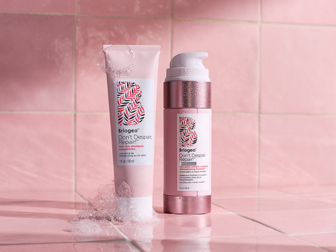 Rich Rice Shampoo Concentrate and Rice Strengthening Treatment in front of a pink tiled background