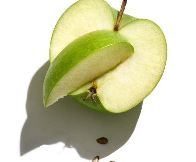 Green apple on white background.