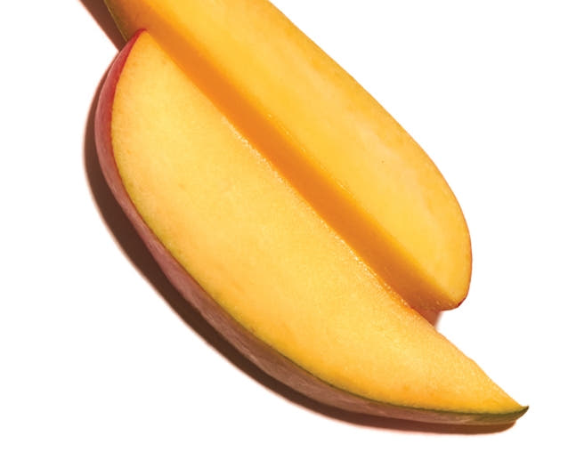 Mango slices on white background. 