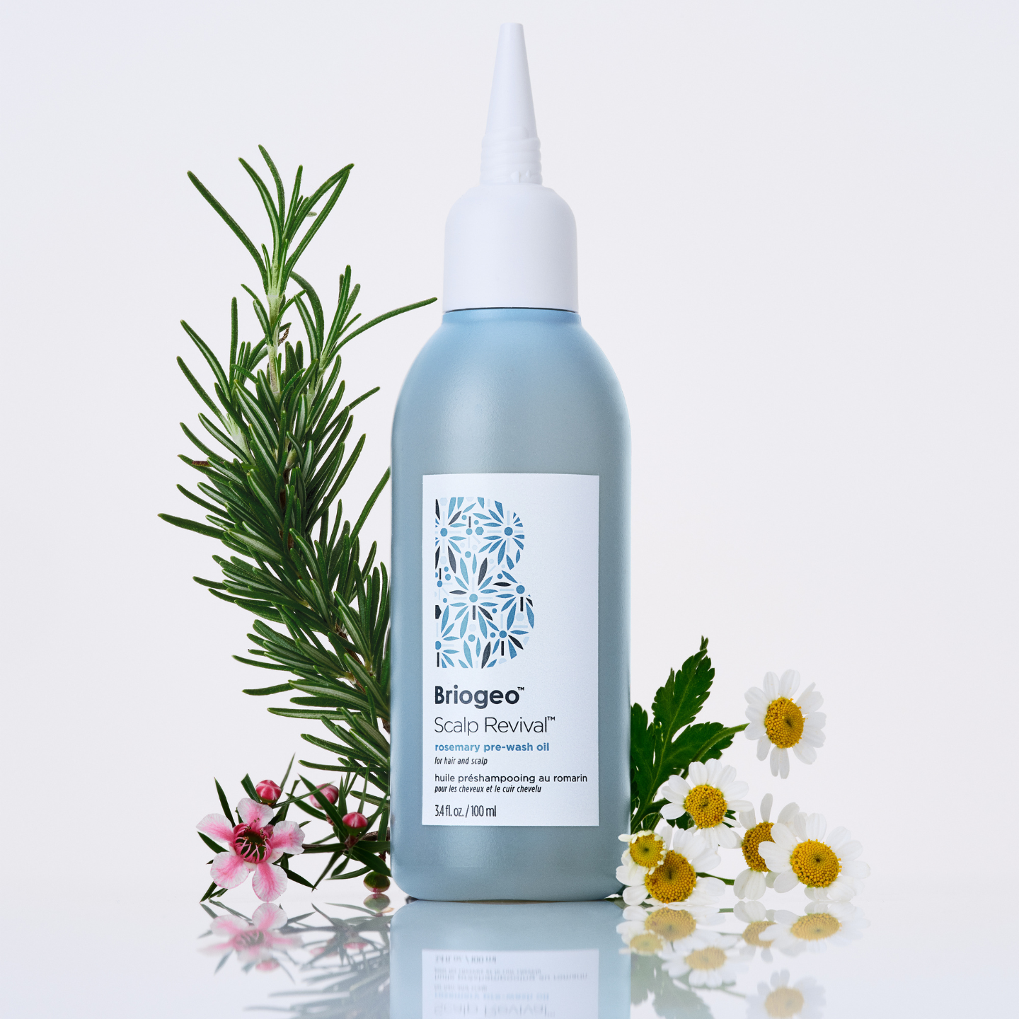 Hand dipping Scalp Revival micro-exfoliating shampoo in shower. 