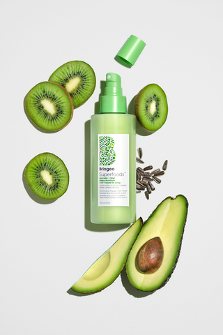 Avocado + Kiwi Leave-In Spray near pieces of avocados and kiwis