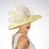 yellow and white polybraid fancy church hat with down turned brim