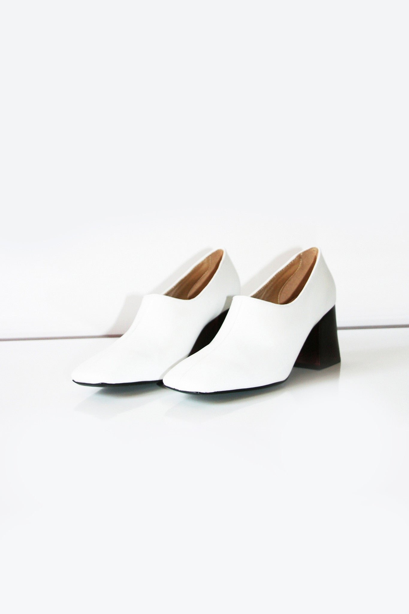 white pumps slip on