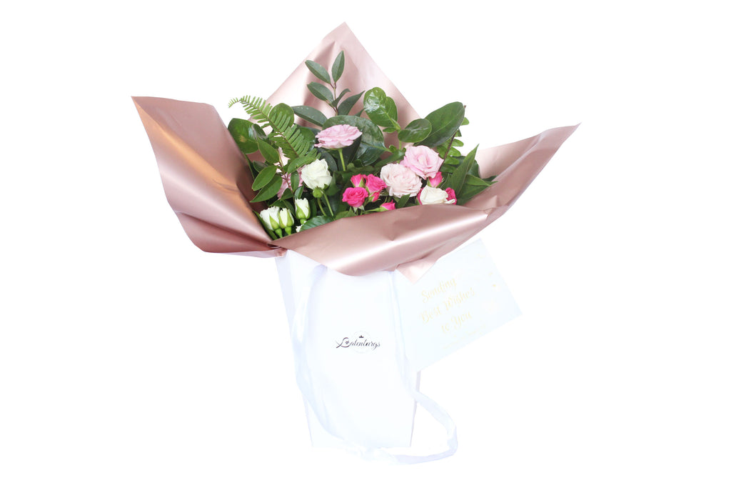 Deluxe white gift bag with romantic packing paper and pink and white roses