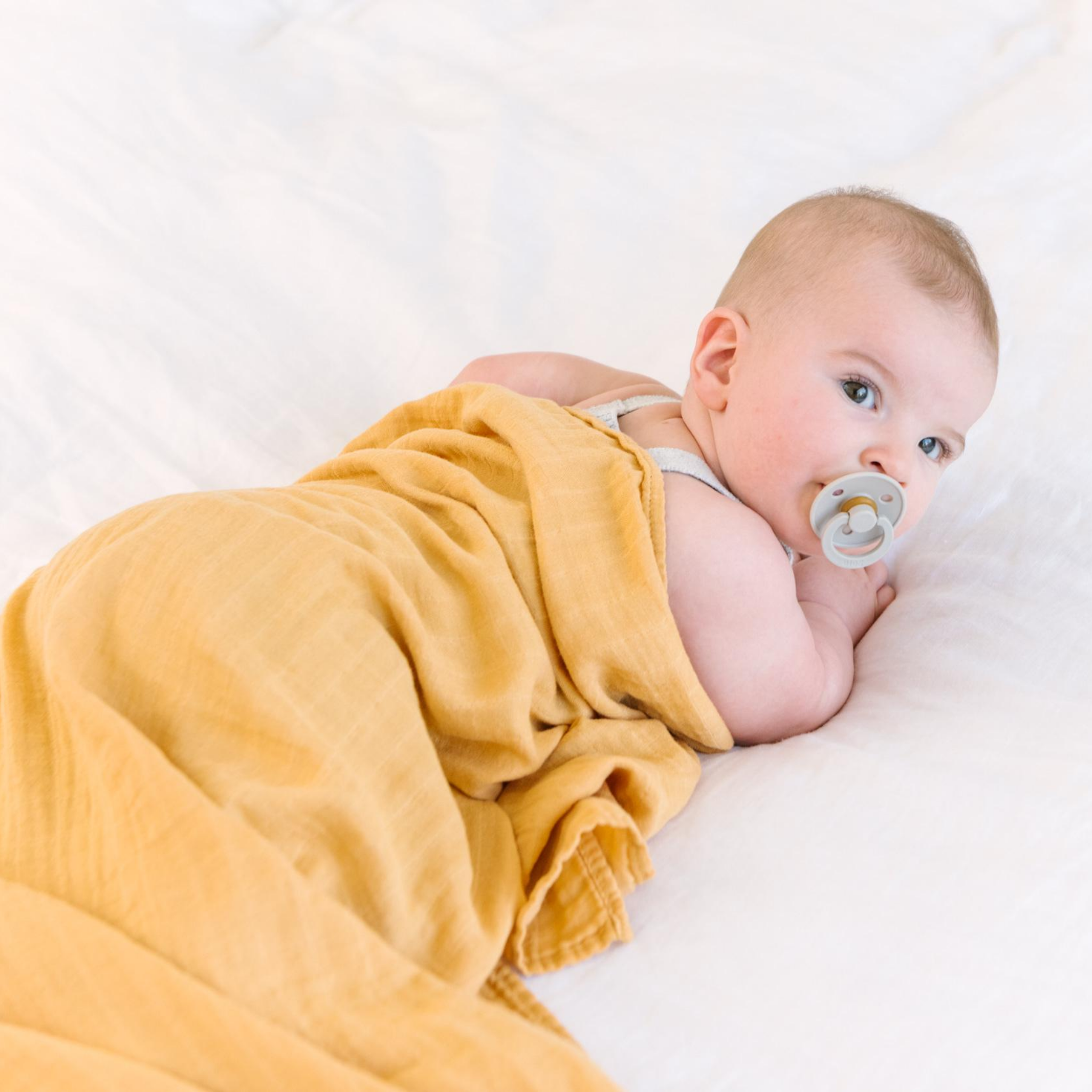 mustard muslin swaddle