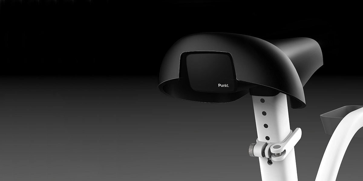 Vista posteriore della sella della bici Punkt. e del modulo di controllo montato sotto il sedile.