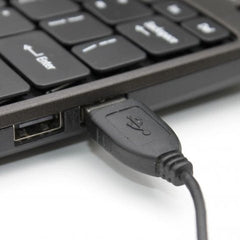 Plug the USB cable into the computer