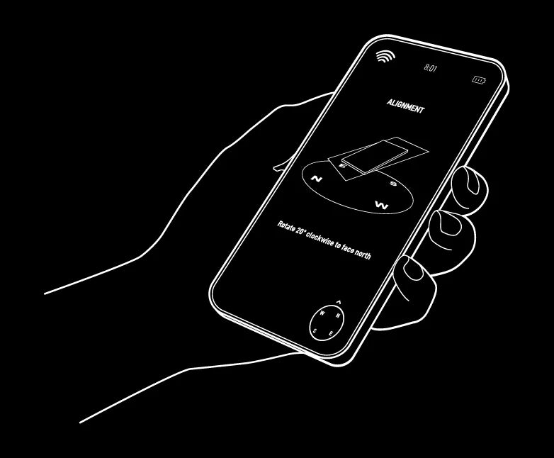 Hand holding phone showing Starlink alignment tool with compass and rotation instructions
