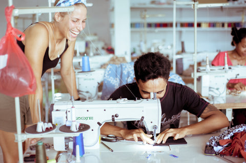 Marie overlooking production of Zealous Surfbikinis