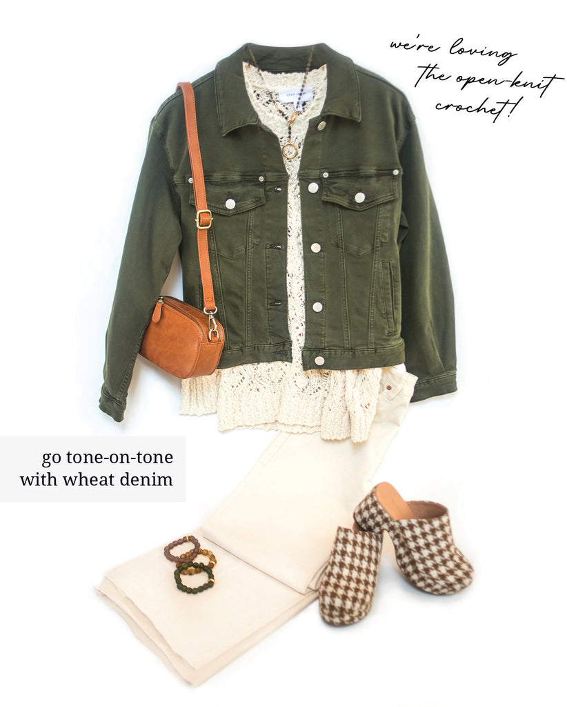fall outfit with olive green jacket and cream pants