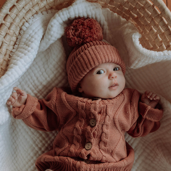 organic cotton knitted cardigan and pom pom beanie