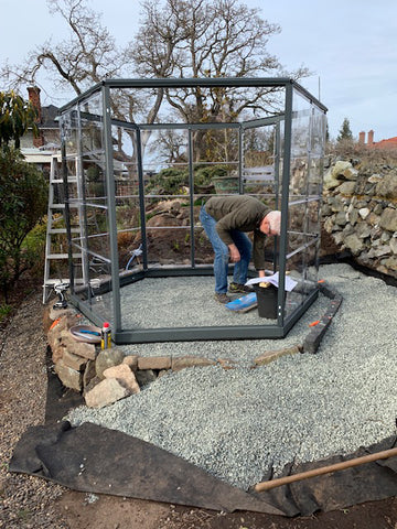 assembling the frame for the greenhouse panels