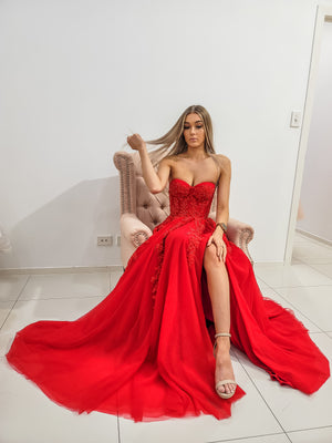 Tiffany red bustier top tulle dress with slit for hire