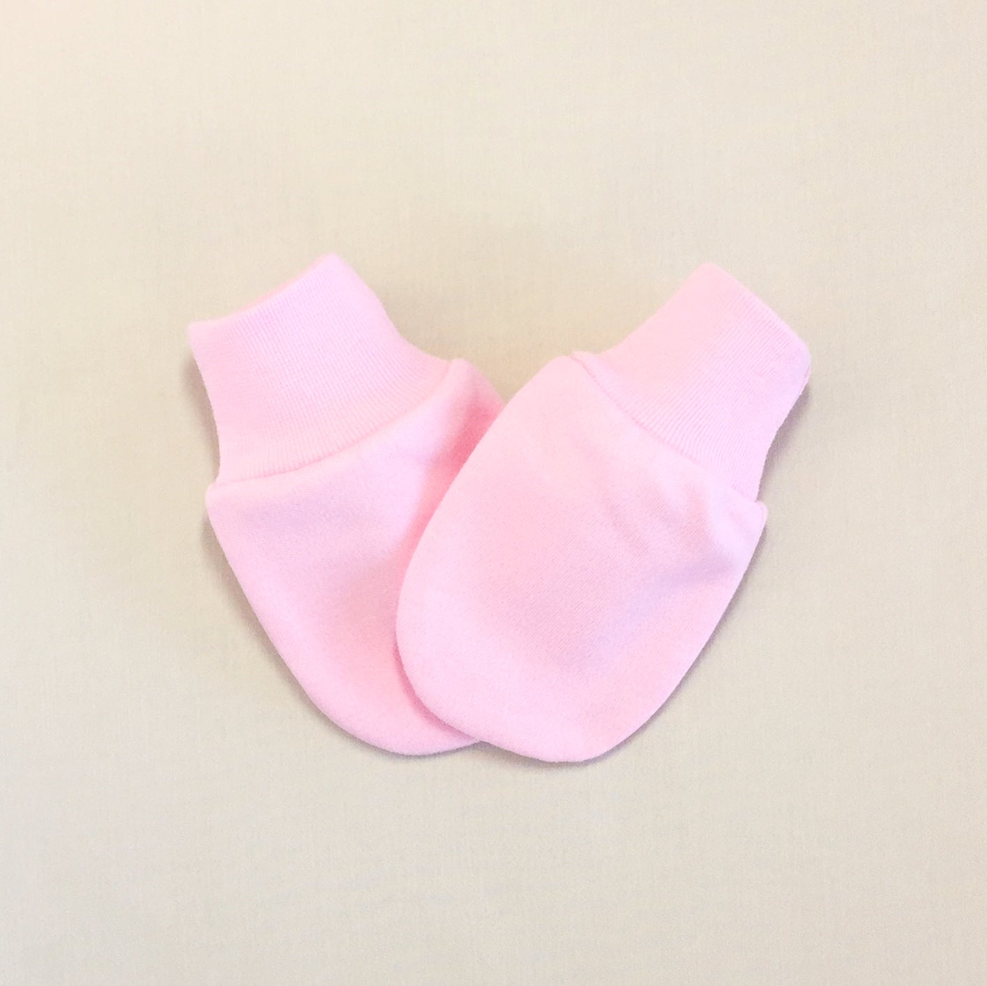 pink baby mittens