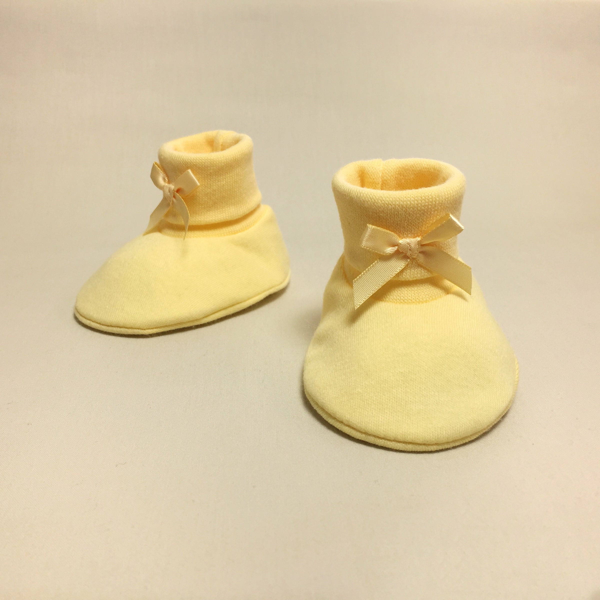 yellow booties baby