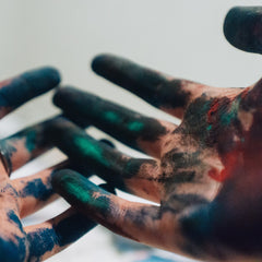 paint covered hands