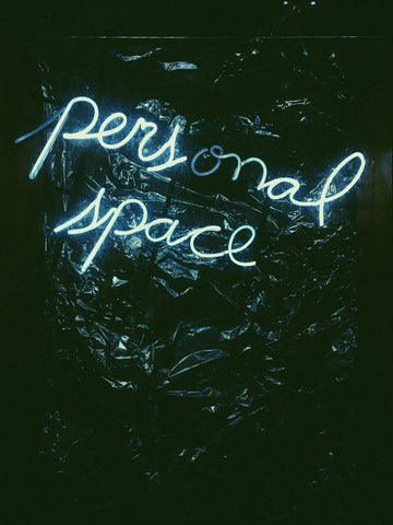 words 'personal space' in neon lights 