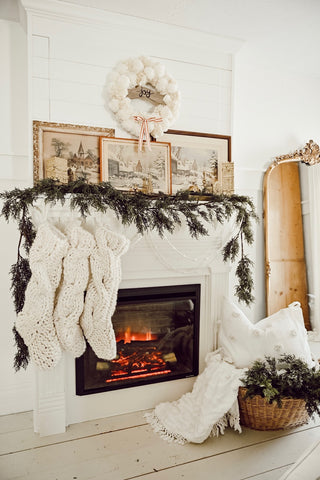 A white Christmas with chic mantelpiece decor