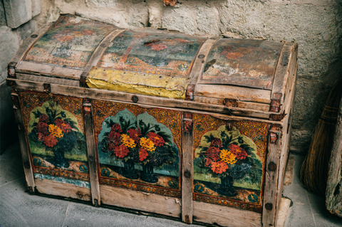 Antique trunk for bedroom.