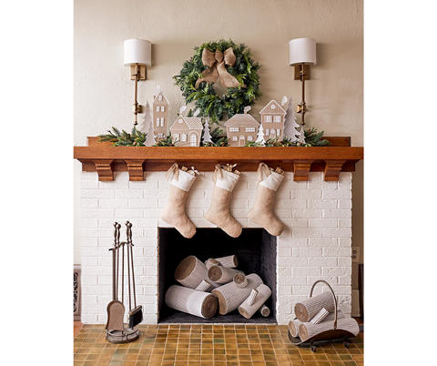 Elegant, cosy and minimalist mantelpiece style, ready for Christmas