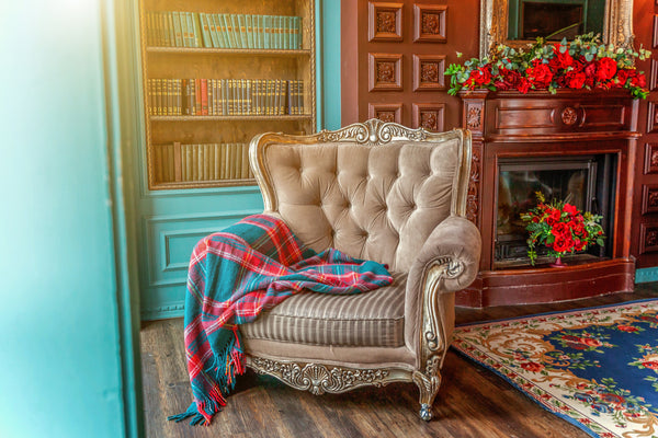 Antique furniture in the living room, armchair, bookshelf.