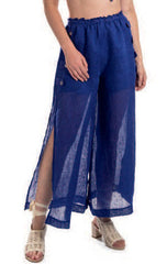 Model wearing 'Action' Beach trousers in Rubik Blue, by Nicole Olivier.