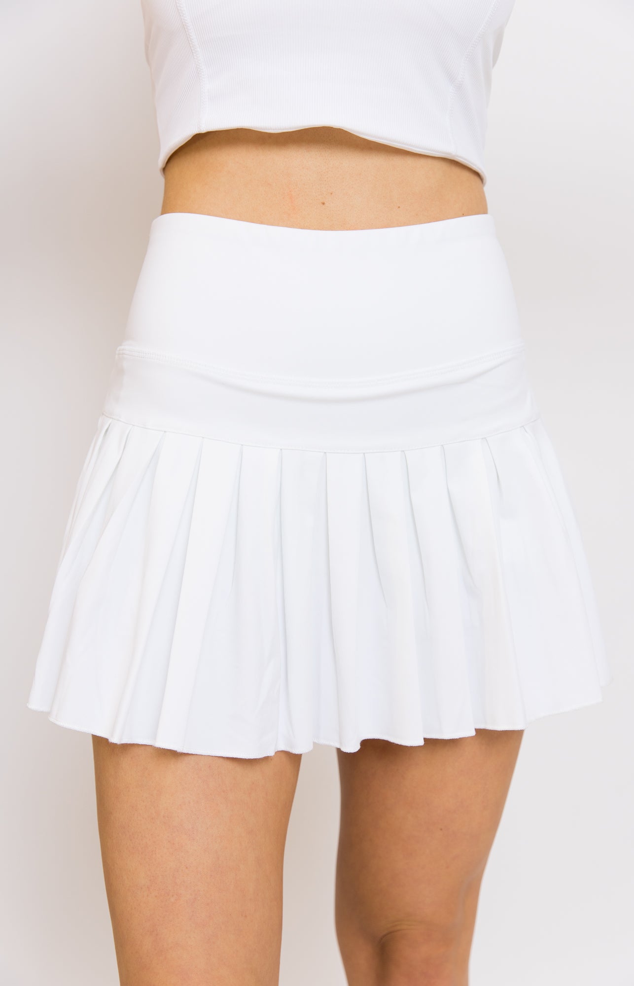 white pleaded tennis skirt