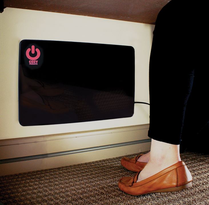 cozy legs flat panel heater mounted to a wall under a desk